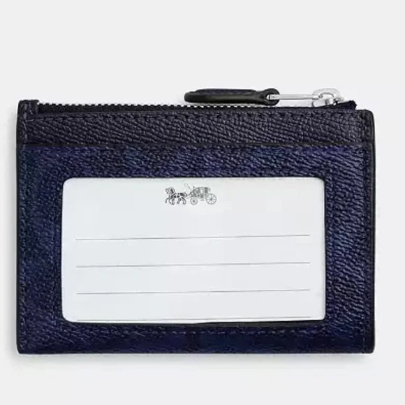 Coach Mini Skinny Id Case
In Signature Canvas NWT in packaging - Picture 2 of 4
